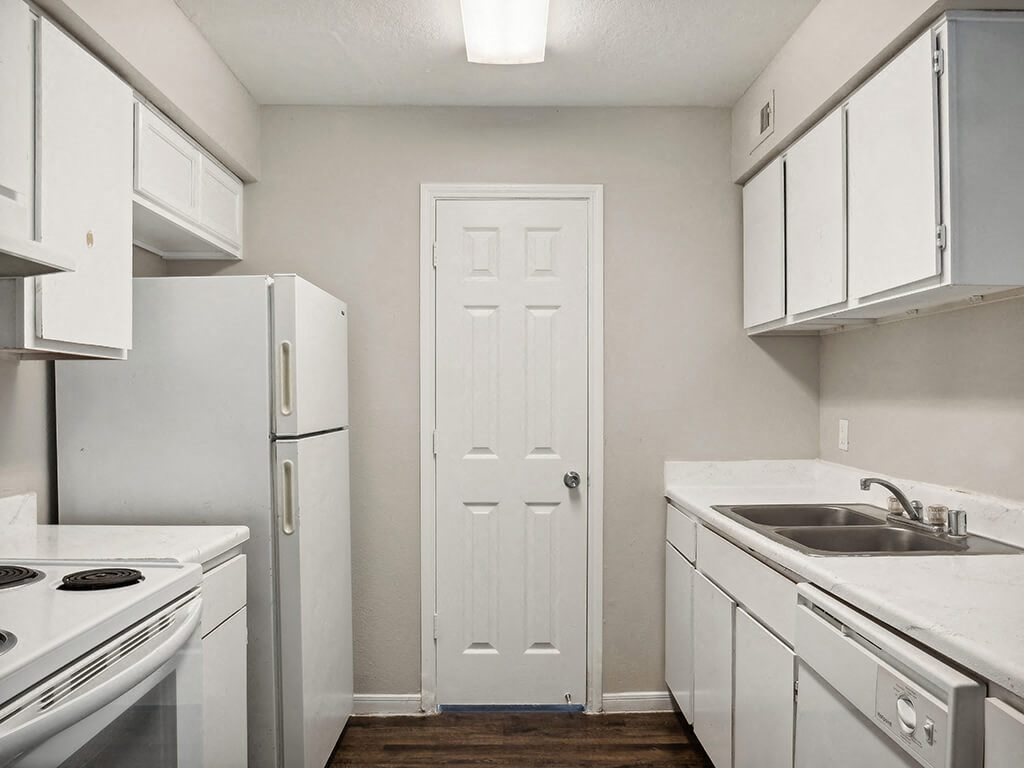 Kitchen cabinets at Park Village Apartments in Conroe TX